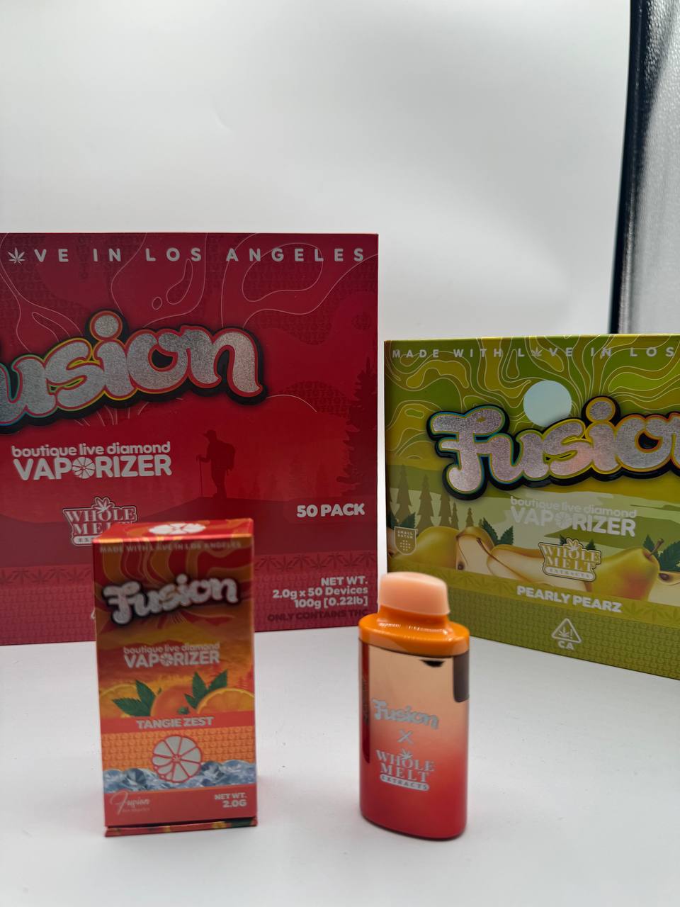 buy-tangie-zest-disposable-vape-cart-2g-online.jpg Whole Melt X Fusion – Tangie Zest Disposable Vape Cart – 2 Grams - Image 1